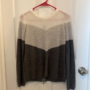 Knit sweater with half zipper back
